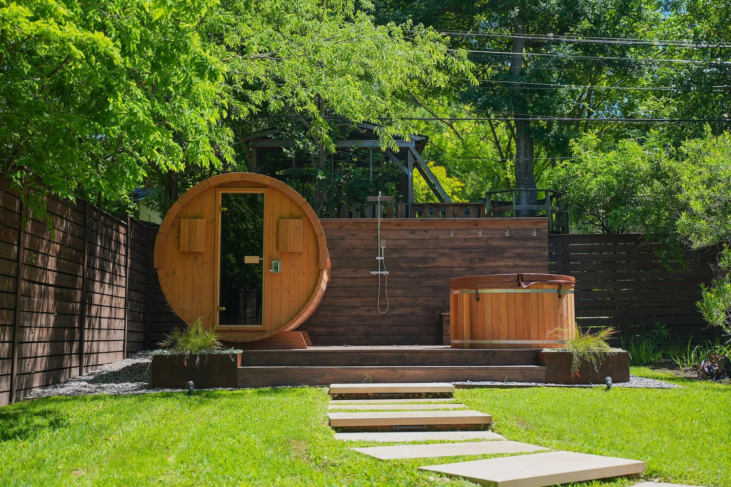 Barrel sauna with cold plunge and outdoor shower