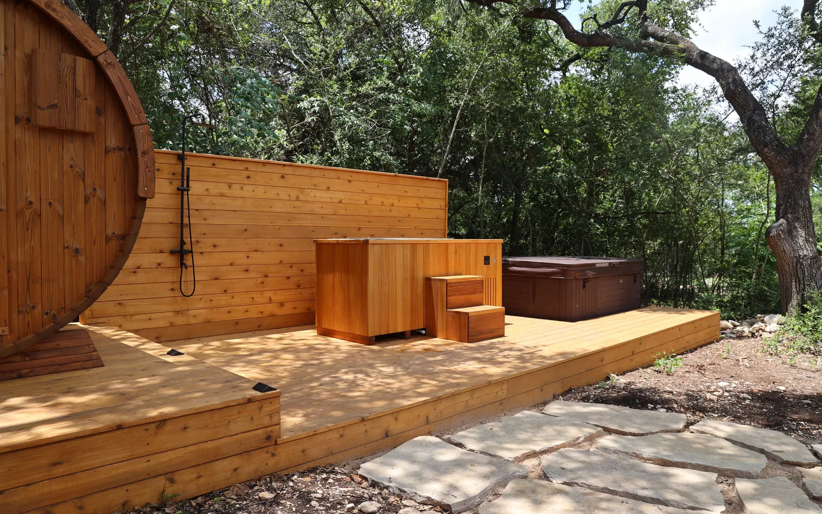 Completed outdoor wellness deck with sauna and cold plunge
